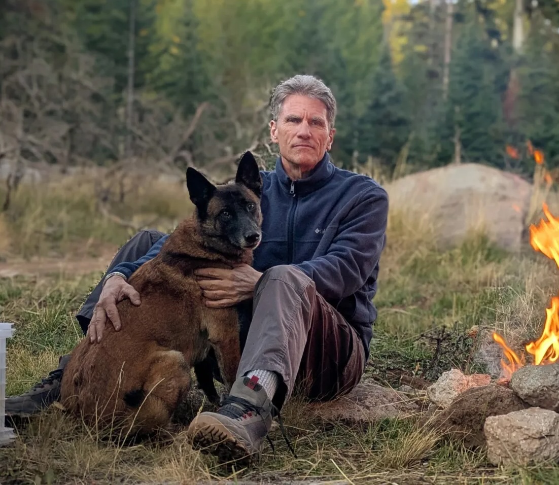 Dr. Stewart Hilliard with malinois